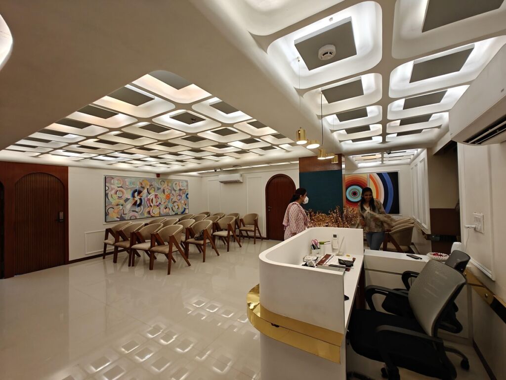 Modern reception and waiting area at Aariv Cancer Care, a leading cancer hospital in Vadodara led by Dr. Mrugal Doshi.